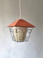 Orange retro pendant lamp with white inner shade and black metal frame