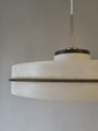 White and brown UFO-style Space Age ceiling lamp from the 1950s&ndash;60s.
