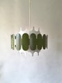 Green and white vintage metal pendant light with layered design and soft light effect