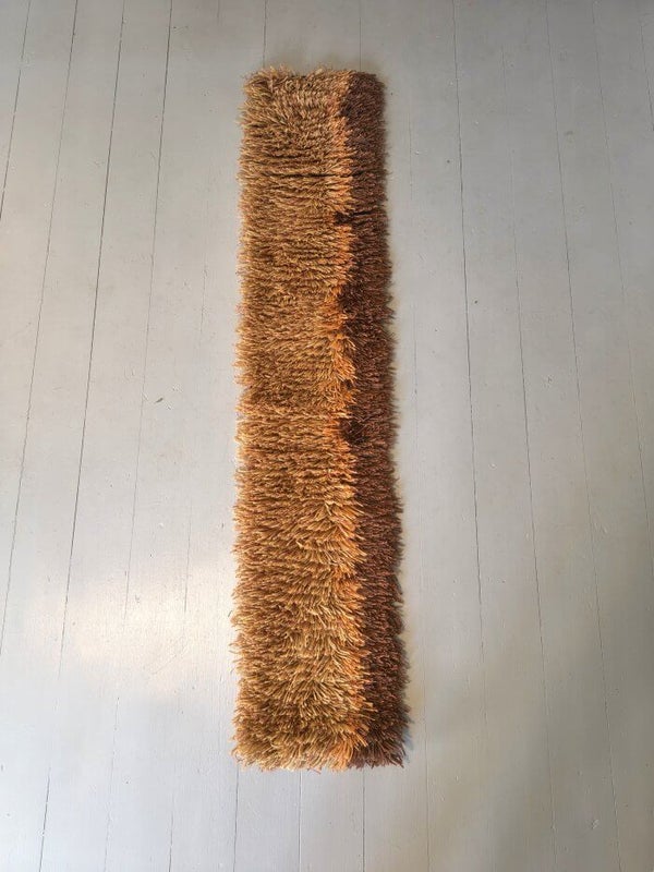 Narrow Finnish rya rug with long pile in brown and ochre tones